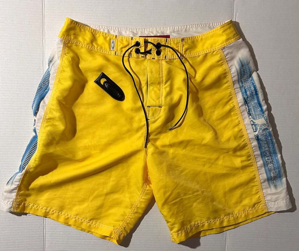 Vintage 90s Oakley Software Era Yellow Board Shorts with Crossbones, Men’s size